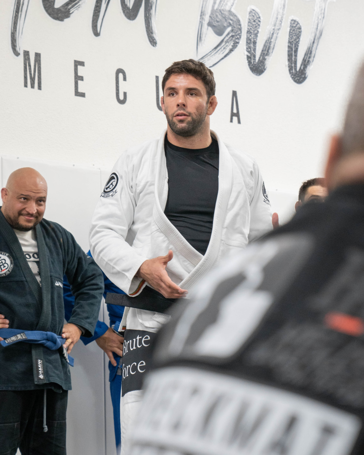 Marcus “Buchecha” Almeida speaking at a jiu-jitsu academy